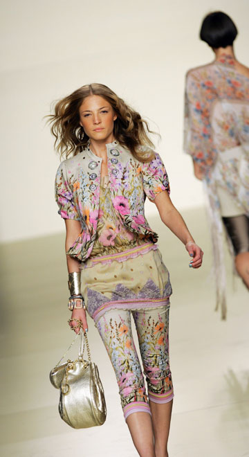 A model displays an outfit created by Victorio&Lucchino during the Spring/Summer 2006-07 Pasarela Cibeles fashion show in Madrid September 20, 2006.