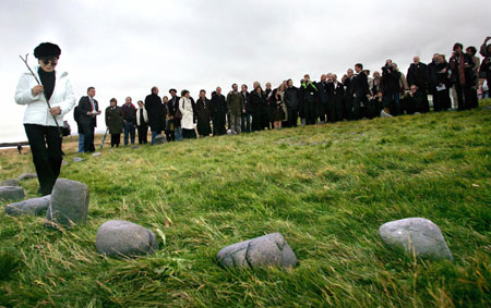 Yoko Ono, the widow of Beatle John Lennon, blesses the site where a peace column will be erected on Videy island, off the north coast of Reykjavik, Iceland October 9, 2006. Ono also presented the LennonOno Grant For Peace to the global medical group Doctors Without Borders and the non-profit Center for Constitutional Rights on Monday, Lennon's birthday.