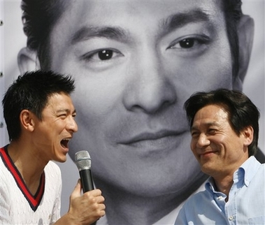 Hong Kong movie star Andy Lau, left, and South Korean actor Ahn Sung-ki attend an event as part of the 11th Pusan International Film Festival in Busan, South Korea, Friday, Oct. 13, 2006.