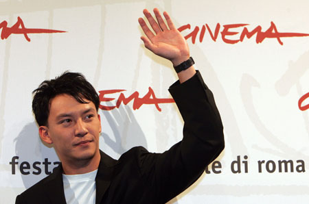 Chinese actor Chang Chen waves as he presents his new movie "The Go Master" at Rome's first international film festival in Rome October 15, 2006.
