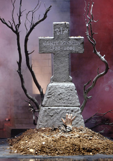 A hand reaches out from a staged grave during the taping of the Fuse/Fangoria Chainsaw Awards at the Orpheum Theater in Los Angeles, California October 15, 2006. The show will air on October 22.