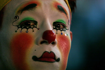 A clown poses for a picture during the International Clown Convention in Mexico City October 17, 2006.