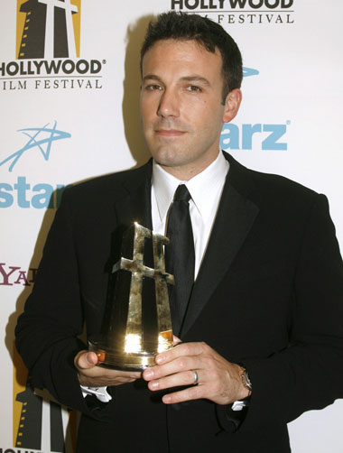 Actress Ben Affleck poses backstage with the supporting actor award he won at the 10th Hollywood Film Festival Awards Gala in Beverly Hills October 23, 2006.