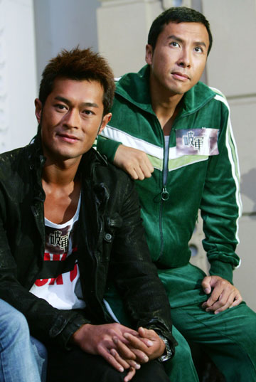 Hong Kong actor Louis Koo (L) and Donnie Yen pose during a news conference to promote their movie 