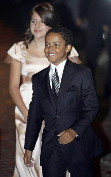 Actor Tom Cruise's children Isabella (L) and Connor arrive for a party at a restaurant in Rome November 16, 2006. 