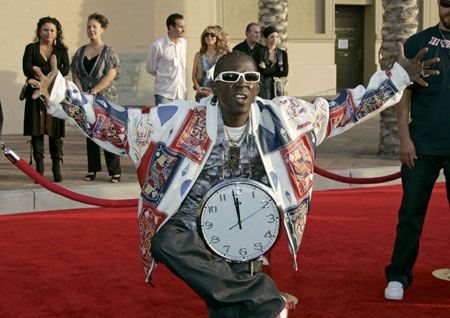 Rap artist Flava Flav arrives at the 2006 American Music Awards November 21, 2006 in Los Angeles.