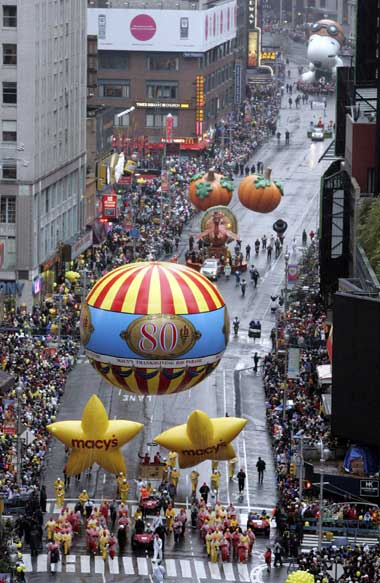 Balloons make their way down Broadway during the annual Macy's Thanksgiving Day Parade in New York, November 23, 2006.