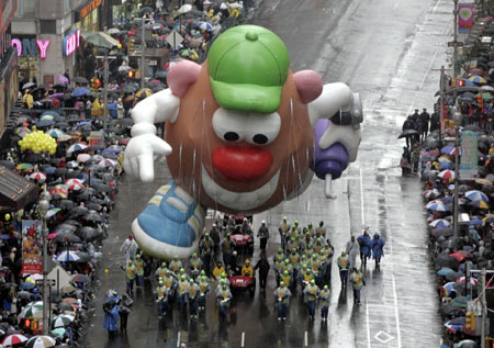 The Mr. Potato Head balloon makes its way down Broadway during the annual Macy's Thanksgiving Day Parade in New York, November 23, 2006.