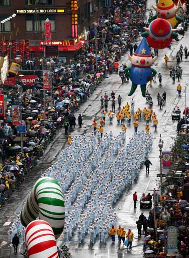 Macy's Thanksgiving Day Parade participants make their way down Broadway in New York November 23, 2006.