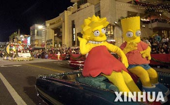 Cartoon figures take part in the 75th Annual Hollywood Christmas Parade in Hollywood city, California, the United States, Nov. 26, 2006.