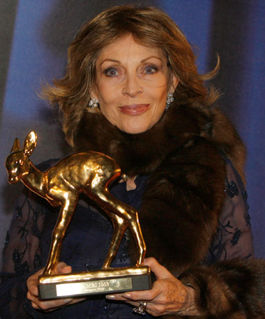 Veronique Peck, widow of actor Gregory Peck holds the Bambi award she received during the 58th Bambi media awards ceremony in the southern German town of Stuttgart November 30, 2006.