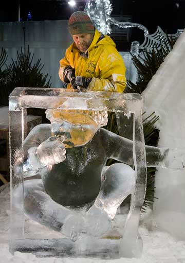 Jiri Genzer of the Chech Republic provides the finishing touch to his ice sculpture of Hans en Grietje, a Dutch fairytale, at the fourth Snow and Ice Sculpture Festival in Eindhoven December 7, 2006.