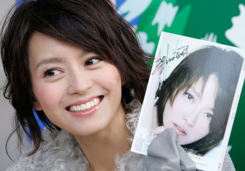 Hong Kong singer Gigi Leung poses during a news conference to promote her latest album 