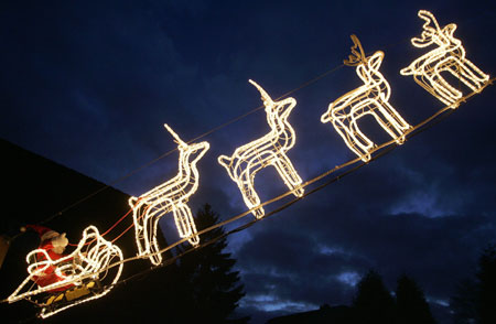 Christmas lights are illuminated at a private house in Hamburg December 18, 2006. 