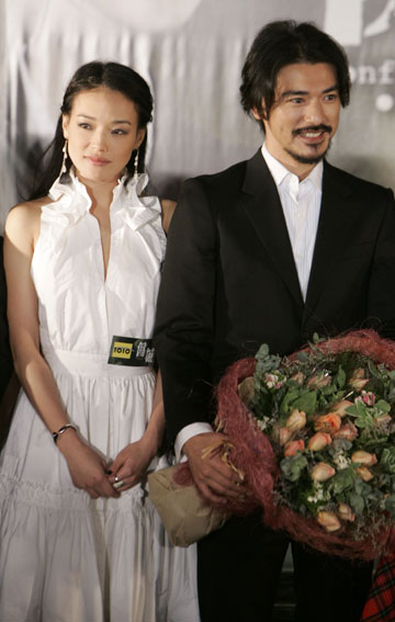 Actress Shu Qi of Taiwan (L) and actor Takeshi Kaneshiro attend the premiere of their movie 