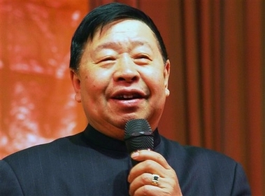 Ma Ji, a roly-poly Chinese comedian during a performance in Huaibei, northern China's Anhui Province, in this photo taken in Jan. 26, 2003 and made available Dec. 20, 2006. Ma, best known for his mastery of puns and satirical dialogues with other performers, died Wednesday, Dec. 20, 2006 of a heart attack, Chinese state media reported. He was 72. 