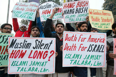 Activists with Islami Jamiat-e-Talba chant anti-U.S. slogans as they protest against the execution of former Iraqi President Saddam Hussein in Lahore December 30, 2006.