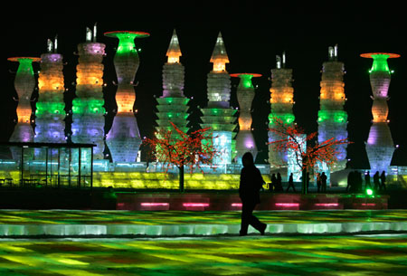 People visit at an ice sculpture art exhibition for the upcoming the China Harbin international ice and snow festival in Harbin, northeastern China's Heilongjiang Province, January 4, 2007.