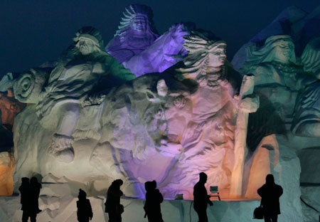 People visit a snow sculpture art exhibition ahead of the China Harbin international ice and snow festival in Harbin, northeastern China's Heilongjiang province, January 3, 2007. 