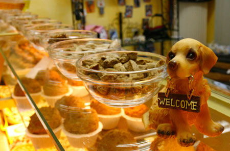 A selection of dog biscuits is seen in the dogs-only bakery 'Dog's Goodies' in the western German city of Wiesbaden January 8, 2007. 'Dog's Goodies' shop owner Janine Saraniti-Lagerin, a former florist, sells her self-baked dog biscuits and fancy cakes to clients from many countries.