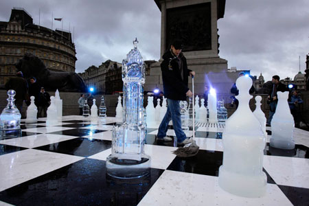 Chess pieces carved from ice are seen on a giant chessboard in Trafalgar Square in London January 11, 2007. The chess game was played via satellite between Trafalgar Square in London and Pushkin Square in Moscow to mark the start of the third annual Russian Winter Festival.