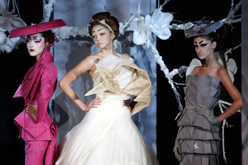 Models present creations by British designer John Galliano as part of French fashion house Dior's Spring-Summer 2007 Haute Couture collection in Paris, January 22, 2007.