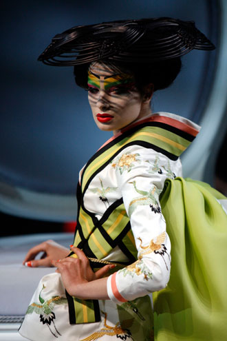 A model presents a creation by British designer John Galliano as part of French fashion house Dior's Spring-Summer 2007 Haute Couture collection in Paris, January 22, 2007. 