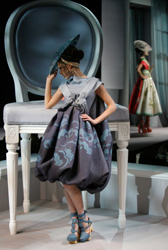 A model presents a creation by British designer John Galliano as part of French fashion house Dior's Spring-Summer 2007 Haute Couture collection in Paris, January 22, 2007. 