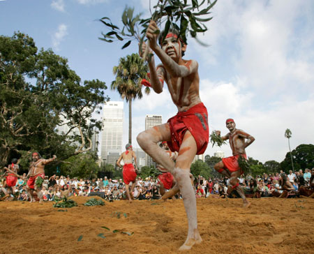 Aboriginal dancers perform in the Woggan-ma-gule Morning Ceremony on the traditional sacred land of the Gadigal People in the Botanical Gardens in Sydney during Australia Day celebrations January 26, 2007. 