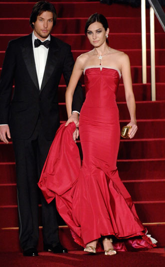 A model wears a Carolina Herrera gown, worn by Renee Zellweger, at 