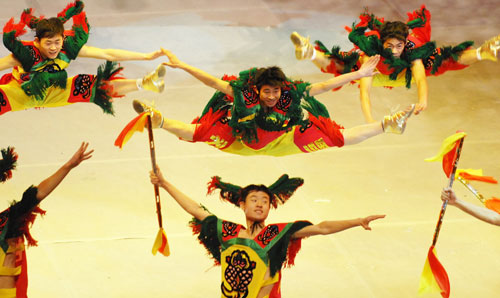 Performers dance during the closing ceremony of the Sixth Asian Winter Games in Changchun, Northeast China's Jilin Province, February 4, 2007.