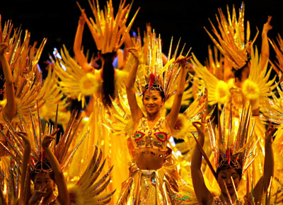 Performers dance during the closing ceremony of the Sixth Asian Winter Games in Changchun, Northeast China's Jilin Province, February 4, 2007.