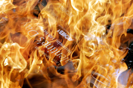Valentine's Day cards are burnt by members of the Forum Against Social Evils (FASE), a civil organisation, in Srinagar February 14, 2007. Hardline Hindu activists protested against celebrations of St Valentine's Day in the Indian capital on Wednesday, calling them immoral and a corruption of the country's ancient civilisation.