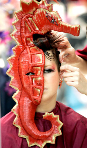A model gets ready for the International Festival of Beauty in St. Petersburg February 22, 2007.