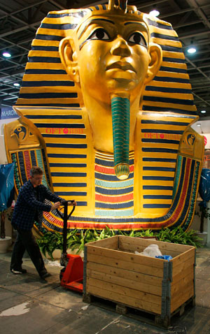 An employee moves a box during the mounting of the 41st international tourism industry fair (ITB) in Berlin March 6, 2007. ITB runs from March 7 to 11, 2007.