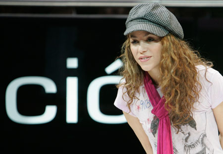 Colombian singer Shakira make an appearance during a promotional event during the second media day of the 77th Geneva car show at the Palexpo in Geneva March 7, 2007. 
