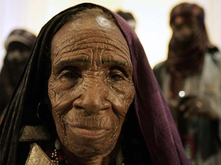 An elderly musician from the Touareg tribe from Sahara desert attends a ceremony marking International women's day in Algiers March 8, 2007.