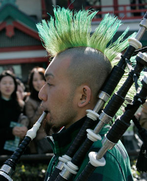 A Japanese man participates in a parade to celebrate Saint Patrick's Day and to introduce Ireland to the Japanese in Tokyo March 18, 2007.