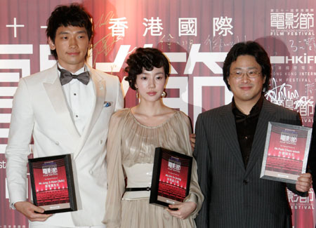 South Korean director Park Chan-wook (R), actress Lim Su-jeong (C) and actor Jung Ji-Hoon, also known as Rain, attend the gala premiere of their movie 