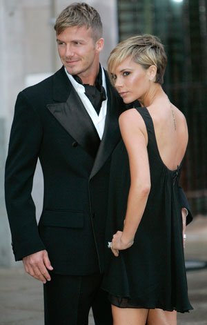 Soccer player David Beckham and his wife Victoria arrive for the Sport Industry Awards 2007 at Old Billingsgate in central London March 29, 2007. The annual industry awards celebrates commercial achievement in British sport.