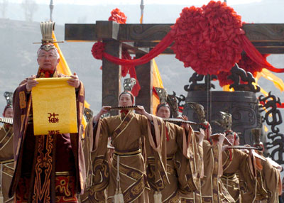 Chinese performers in traditional costumes perform during a sacrifice ritual for Huang Di in Huangling County, Northwest China's Shaanxi Province, where legend has it that Huang Di (Yellow Emperor) is buried. About 10,000 people attended the grand ceremony on Qingming Festival, also known as Tomb-sweeping Day that falls on April 5, a day for the Chinese to remember and honour one's ancestors.