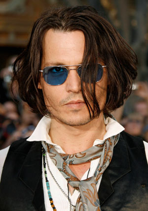 Cast member Johnny Depp poses at the premiere of 