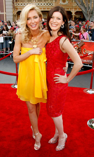 Cast members Vanessa Branch (L) and Lauren Maher pose at the premiere of 