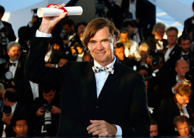 U.S. director Gus Van Sant holds the 60th Anniversary Prize for his film 