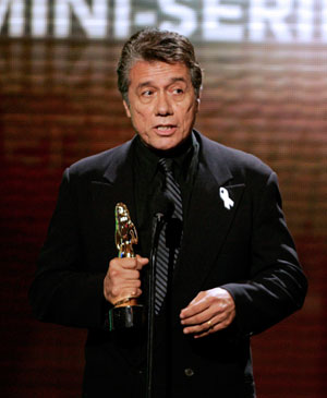 Edward James Olmos accepts the award for outstanding director in a television series, mini-series, or TV movie for his work in HBO's 'Walkout' at the taping of the ALMA awards in Pasadena, California June 1, 2007.
