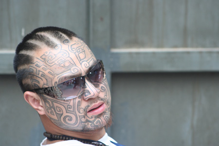 A man shows the designs on his face during the Tattoo Show Convention China 2007 in Beijing June 16, 2007.