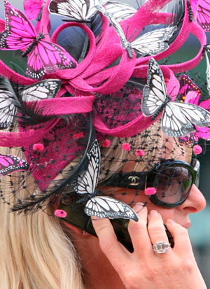 A race-goer arrives for Ladies Day on the third day of the Royal Ascot horse racing meet June 21, 2007.