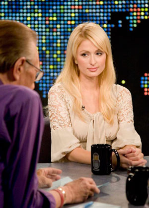 Paris Hilton sits down for an interview with host Larry King (L) on CNN's 