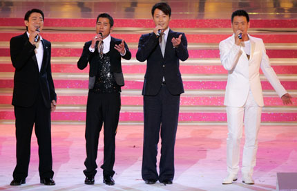 (From L) Hong Kong singer Andy Lau, Aaron Kwok, Leon Lai and Jackie Cheung perform during the Grand Variety Show in Hong Kong June 30, 2007. The show is part of a series of events celebrating the 10th anniversary of Hong Kong's handover to China.