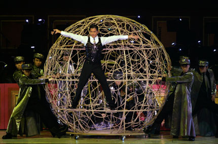 Hong Kong singer Aaron Kwok perform during the Grand Variety Show in Hong Kong June 30, 2007. The show is part of a series of events celebrating the 10th anniversary of Hong Kong's handover to China.